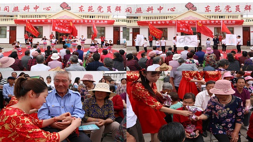 新能源公司党总支组织“情系端午节，粽子传爱心” 党员进社区实践活动